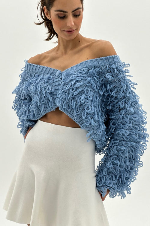 Cropped Cardigan mit flauschiger Struktur.