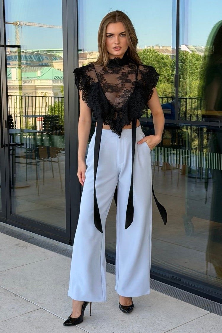 Eleganter Zweiteiler mit locker geschnittenem Blazer und High-Waist-Hose.